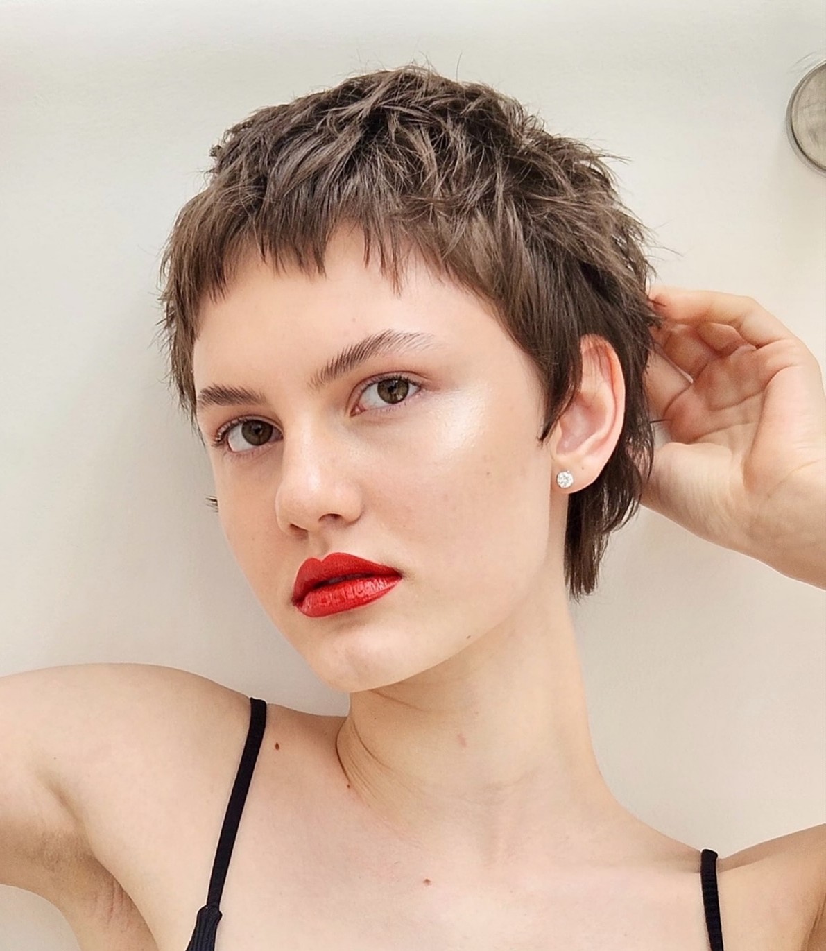 Choppy Brown Pixie Cut with Short Wispy Bangs and Textured Layers