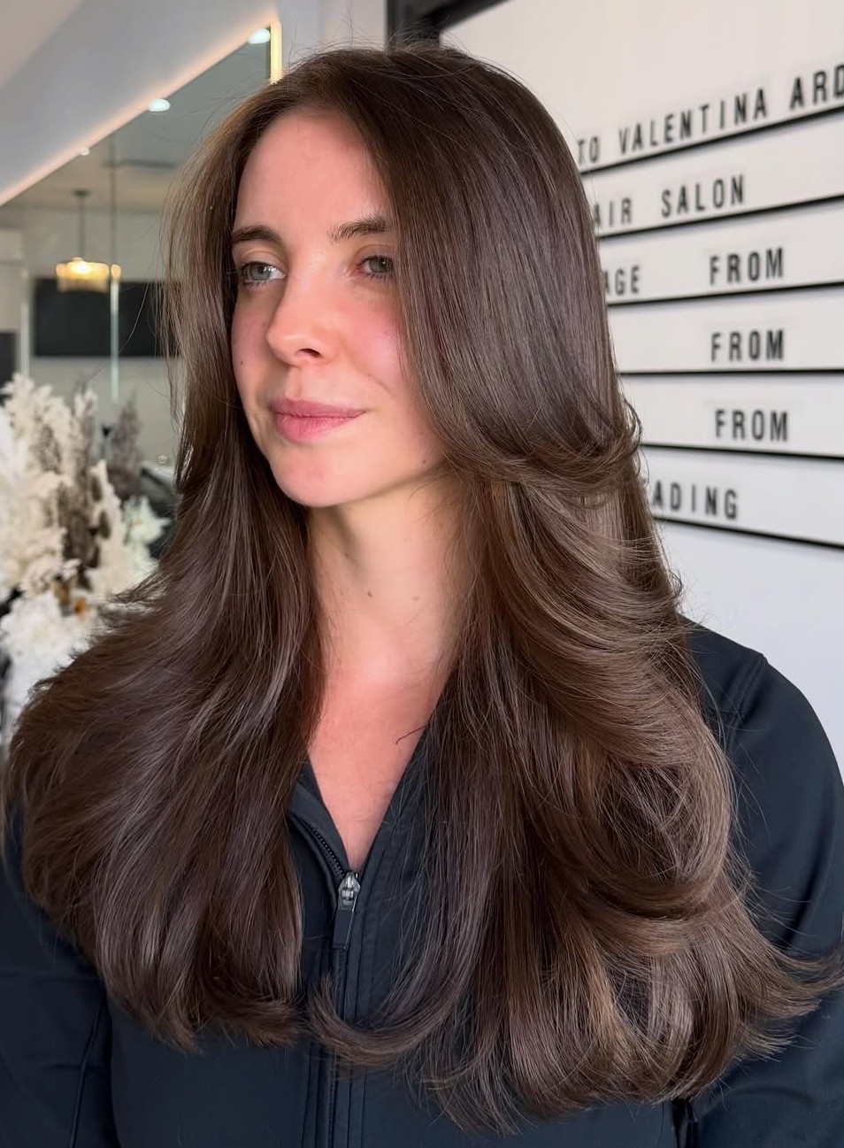Voluminous Long Rich Brunette Hair with Dramatic Face-Framing Layers