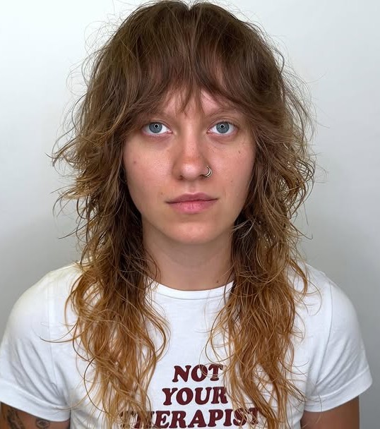 Long Wavy Shag Haircut with Textured Choppy Bangs