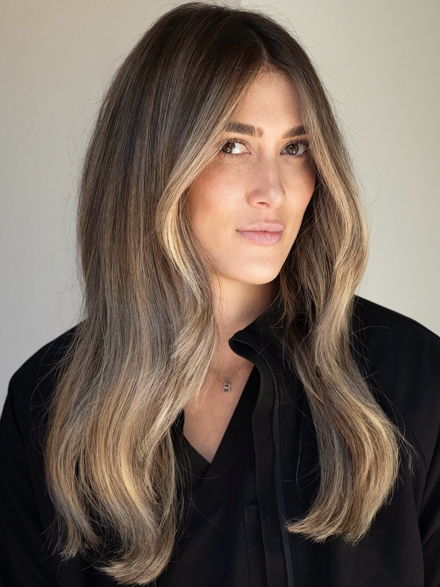 Lived-In Balayage Hair with Seamless Root Growth Requiring Low Maintenance Between Visits