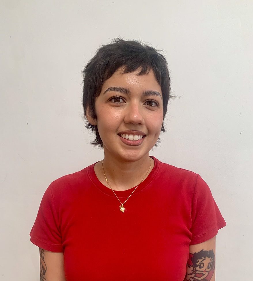 Short Messy Brunette Pixie Crop with Micro Bangs and Natural Texture