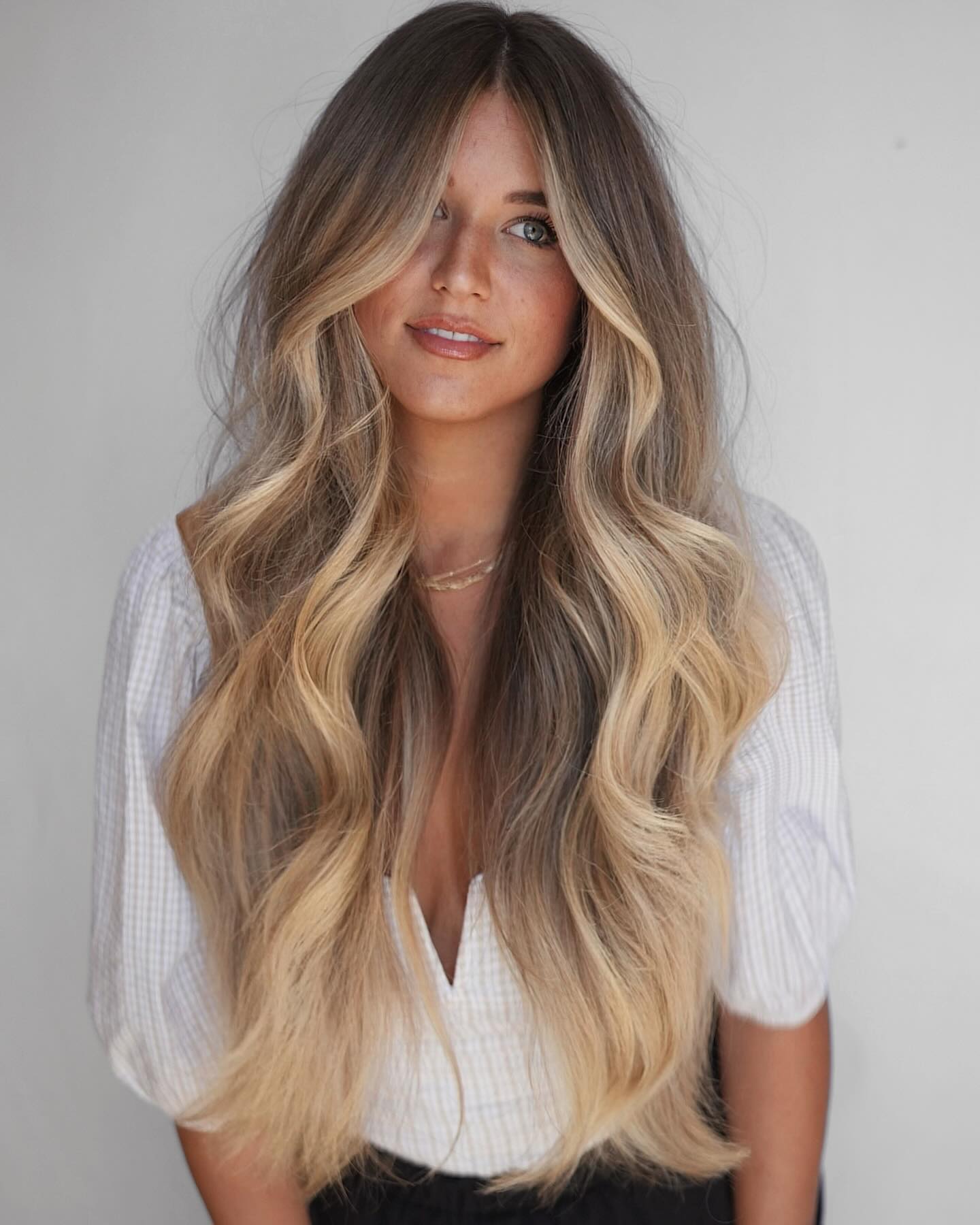 Luxurious Extra Long Blonde Waves with a Premium Shadow Root to Discuss Technique Costs