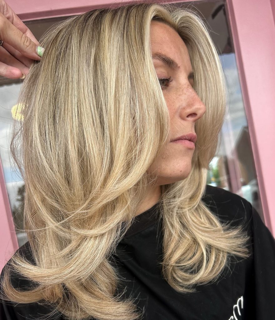 Blow-Drying Medium Layered Hair with a Round Brush for a Polished Everyday Finish