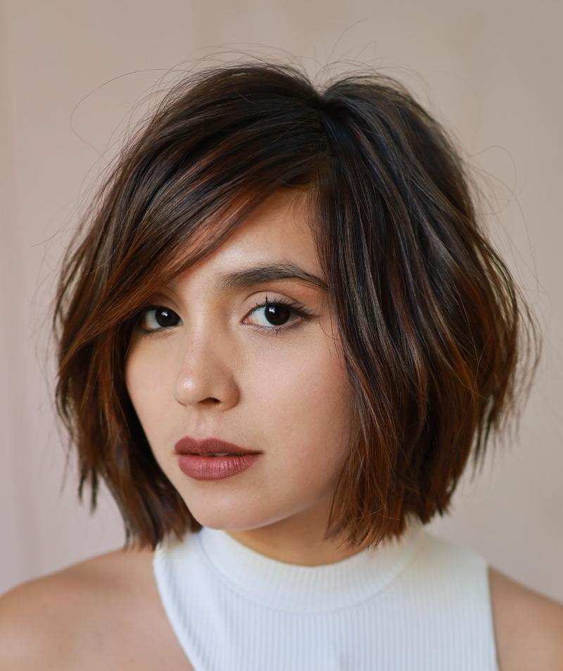 Trendy Side-Swept Bangs with Bob Haircut Ideas