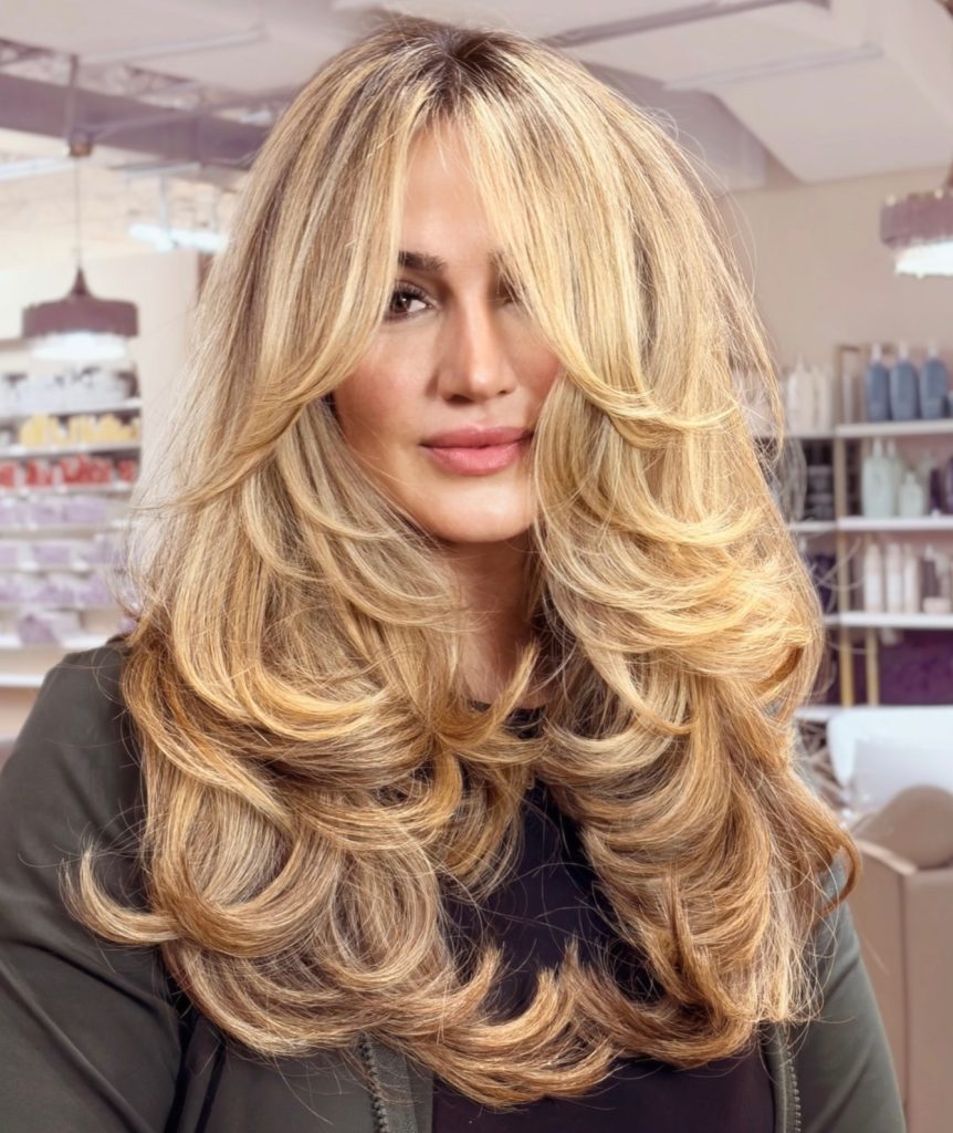 Long Layered Haircut with Cascading Face-Framing Layers on Thick Hair