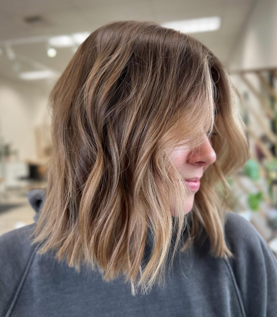Layered Shoulder-Length Haircut with Weight-Removing Internal Layers