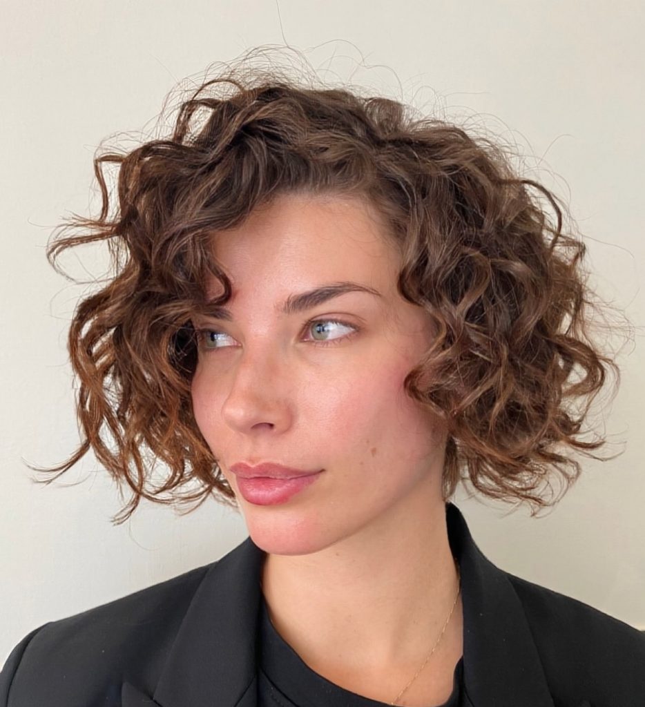 Asymmetrical Curly Bob Haircut for Modern Volume and Shape