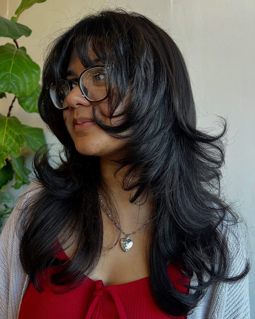 Heavily Textured Long Layered Haircut with Choppy Ends on Thick Dark Hair