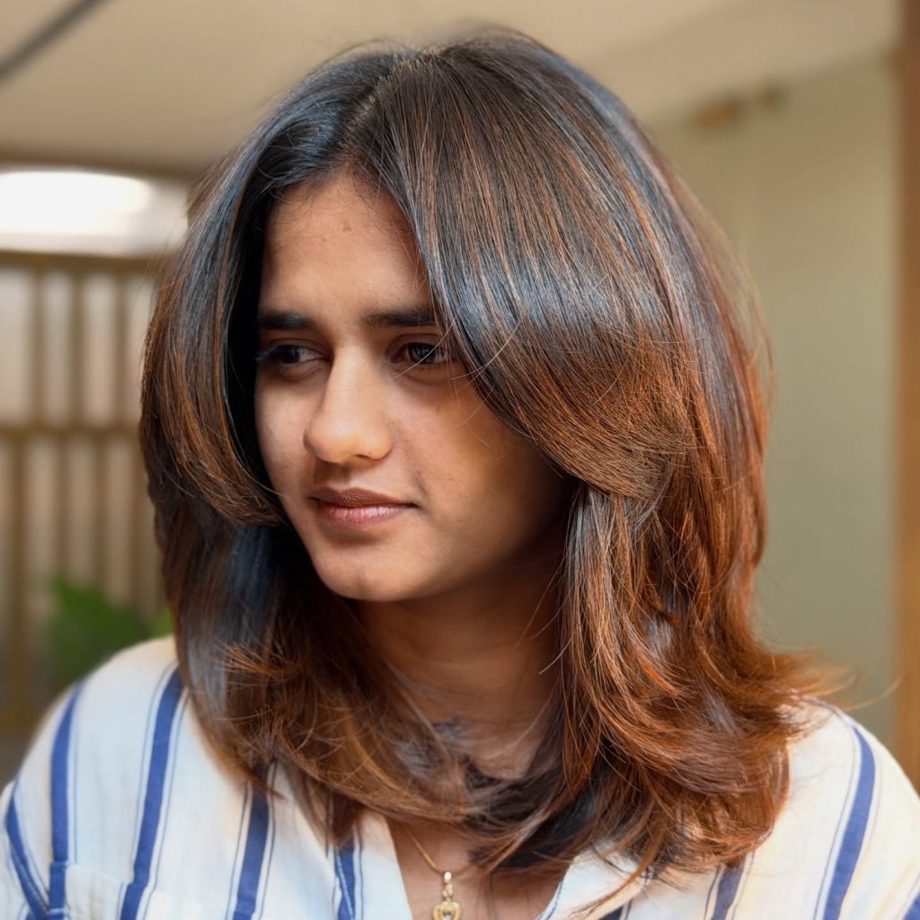 Medium Layered Haircut with Balayage Highlights on Brunette Shoulder-Length Hair