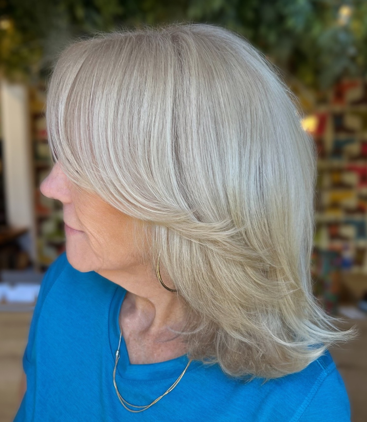 Layered Blonde Medium Bob Haircut with Fringe for Women Over 50