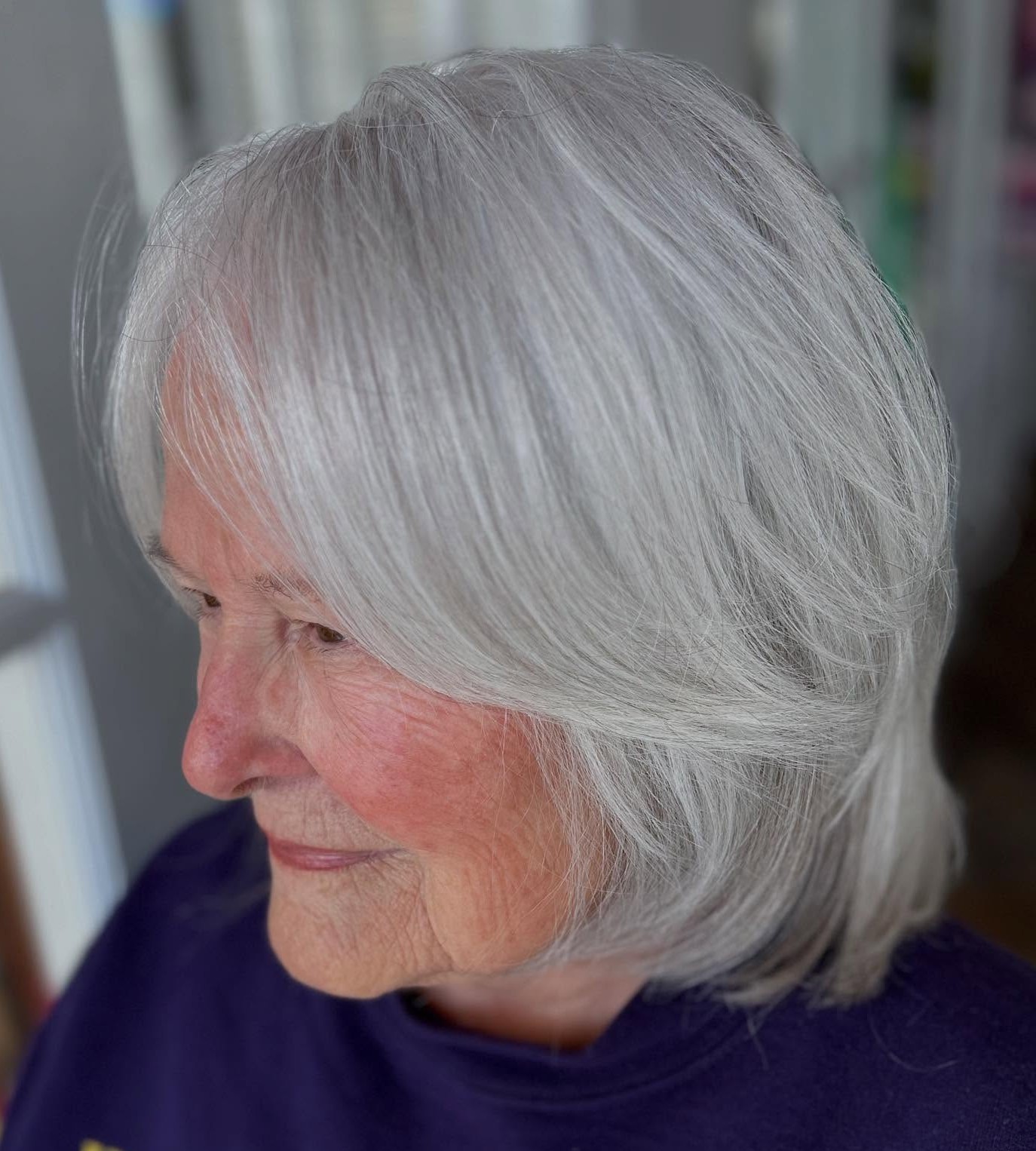 Shoulder Length Layered Silver Haircut for Women Over 70