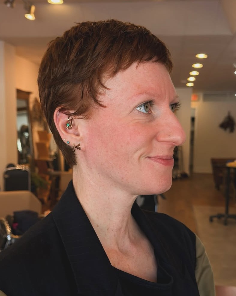 Auburn Pixie Haircut with Short Fringe Side Profile