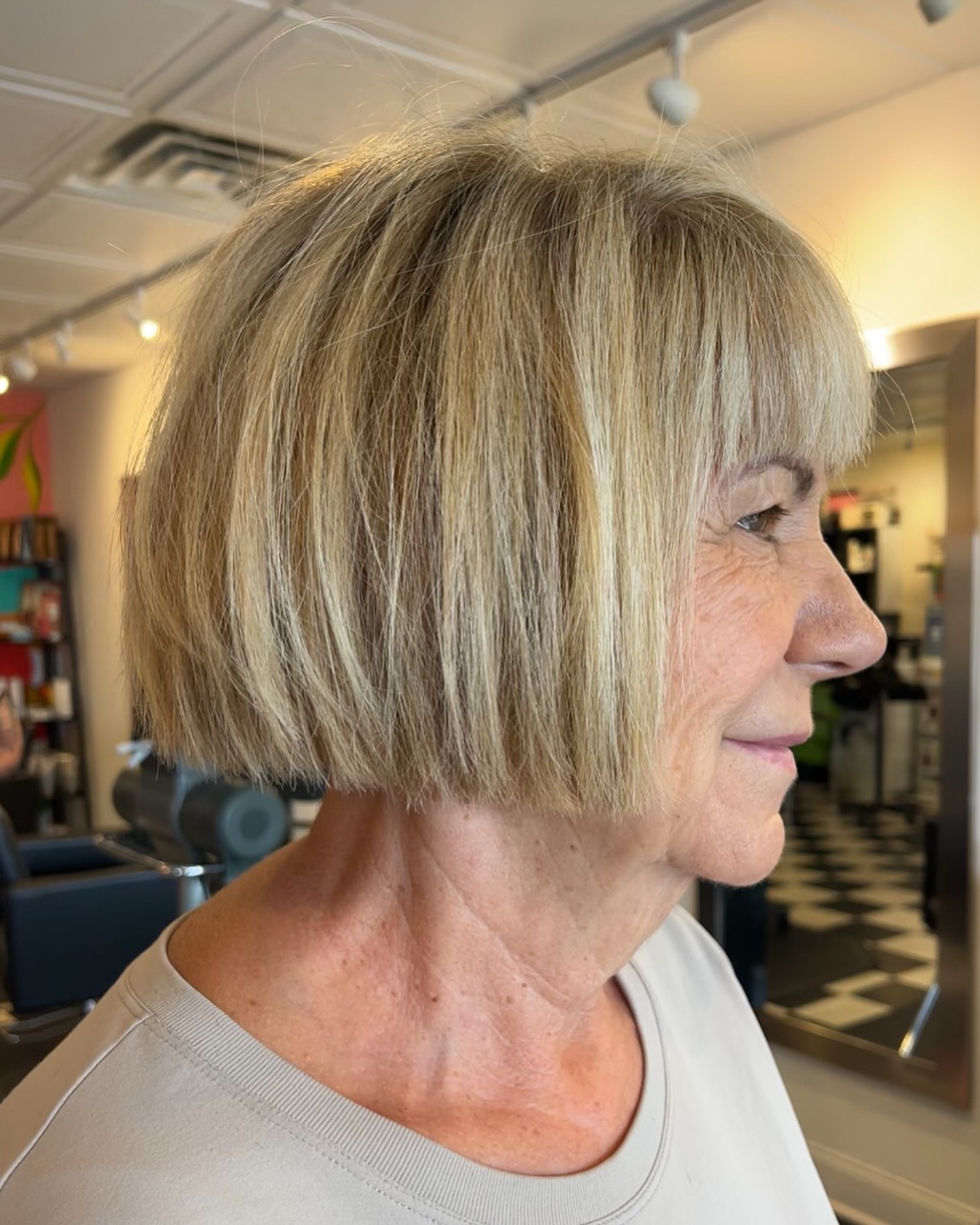 Classic Blonde Bob Haircut with Straight Bangs