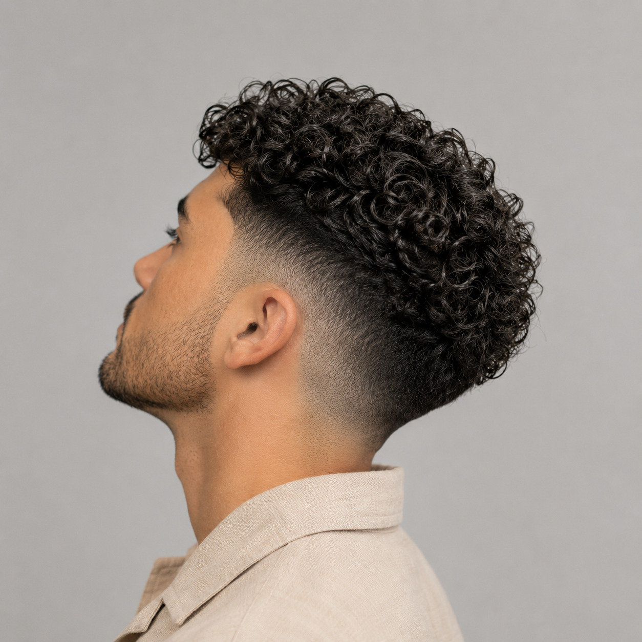 Curly-Top Mid Taper With Defined Natural Ringlets And Clean Temple Blend