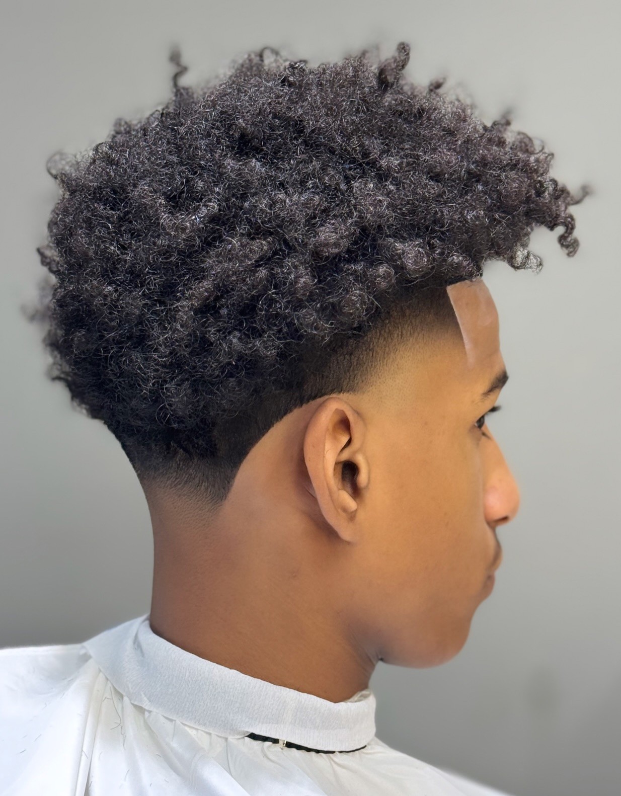 Taper Fade Curly Top Versus an Afro