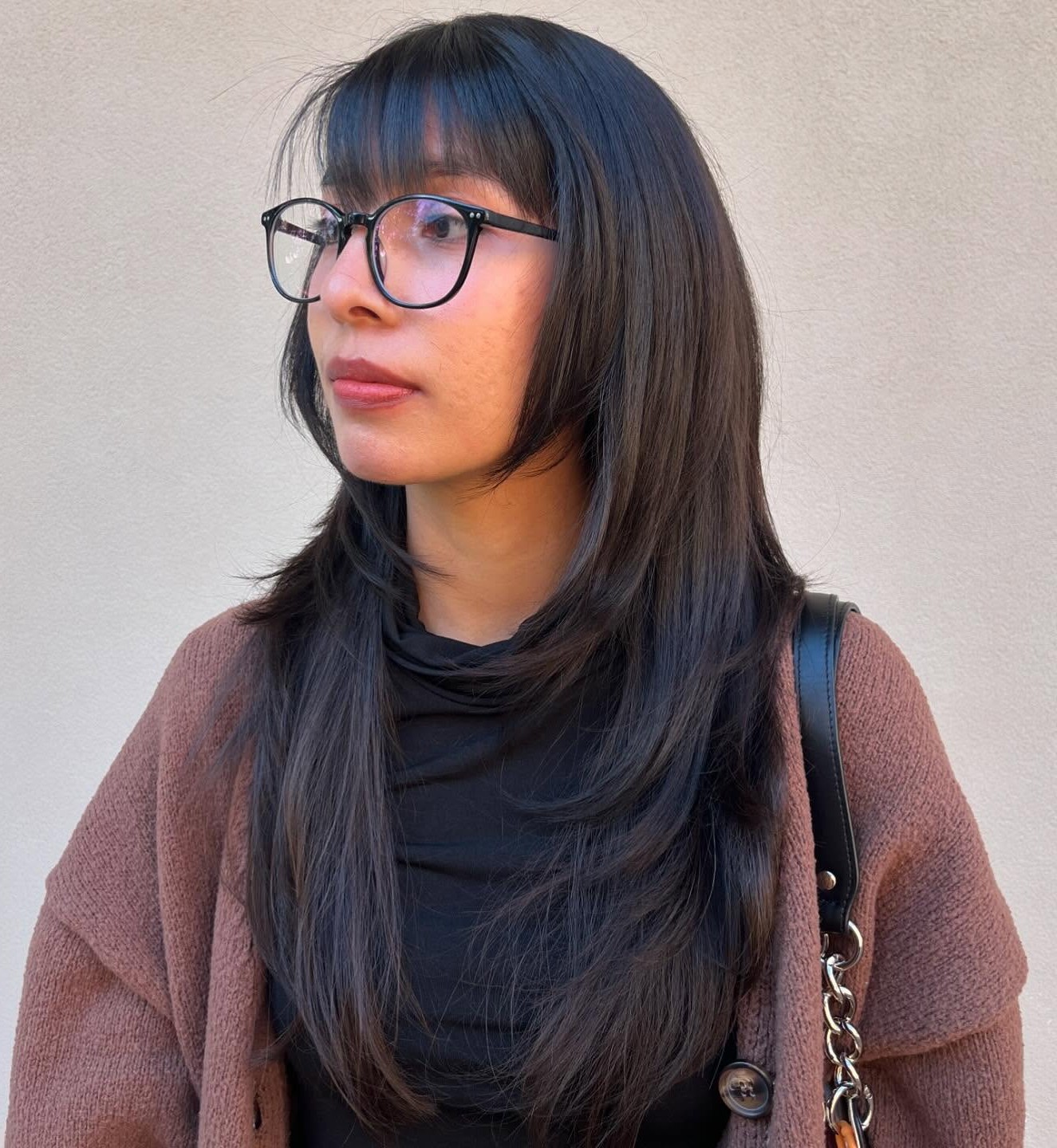 Long Sleek Black Wolf Cut with Straight Bangs