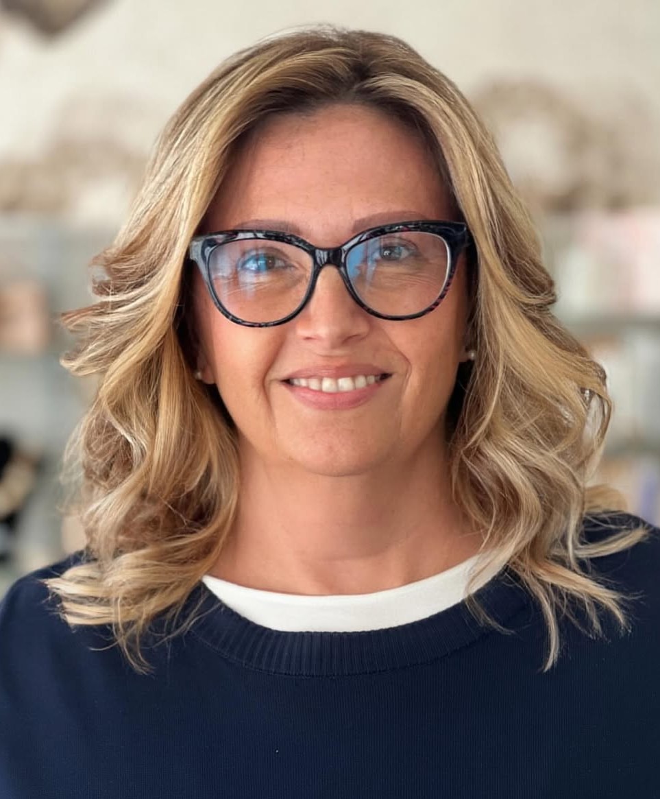 Medium Length Blonde Layered Waves for Older Women with Glasses