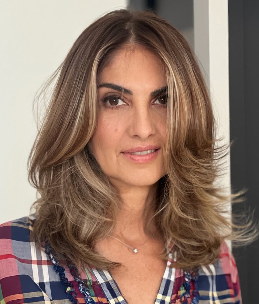 Medium Length Layered Blonde Blowout Haircut
