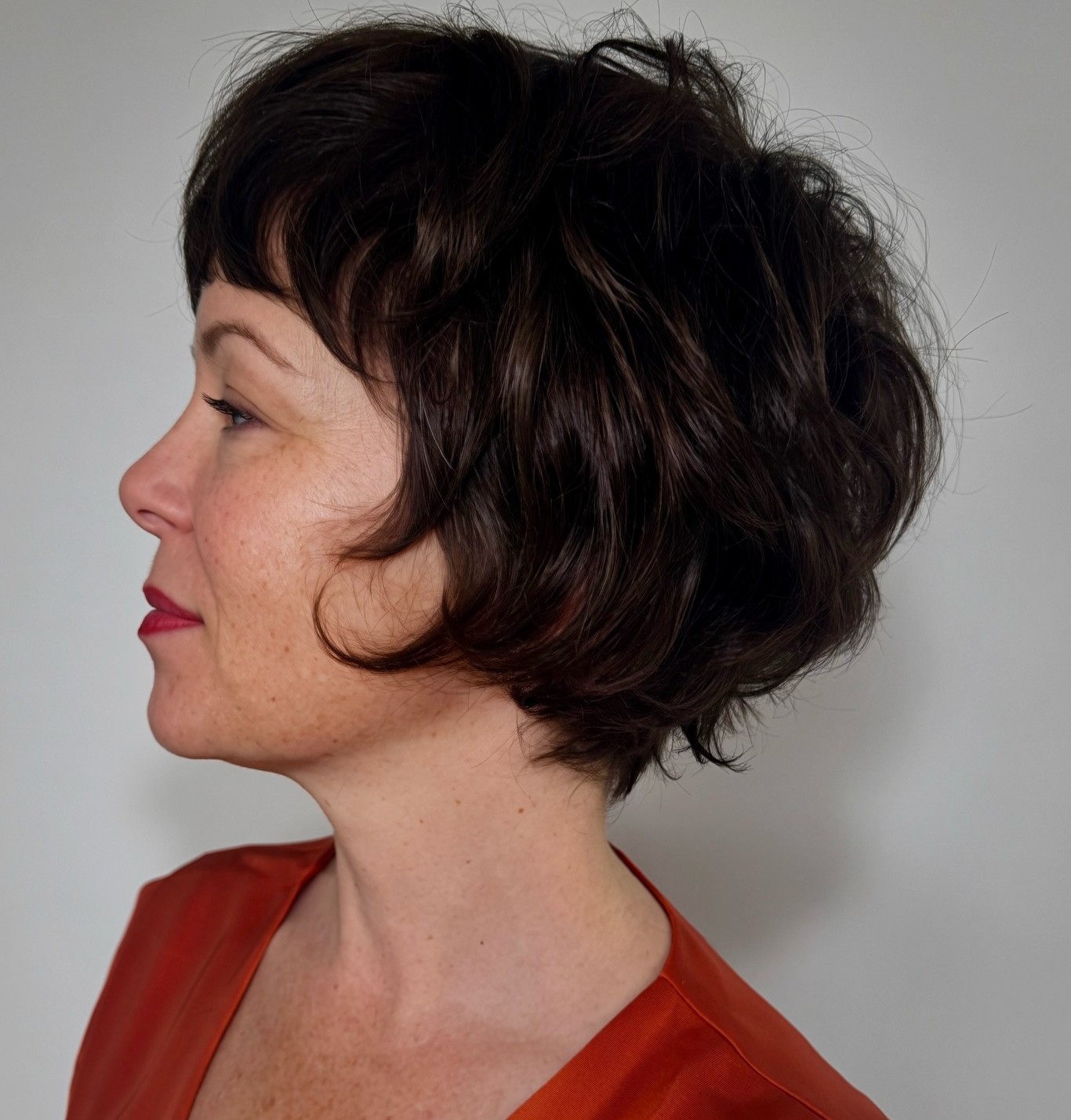 Textured Pixie Bob Bixie with Point-Cut Ends at Ear Length on Wavy Hair