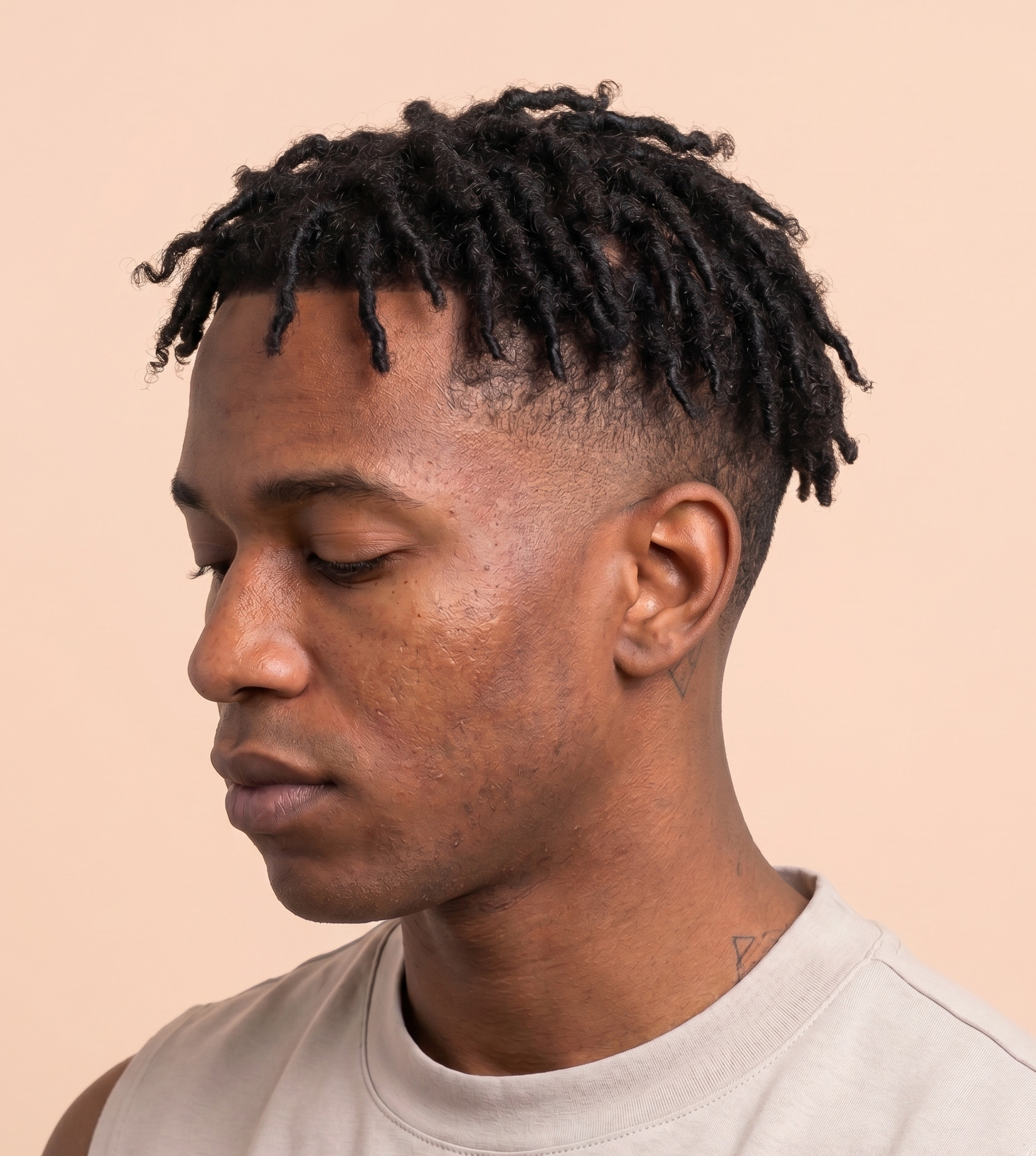Modern Low Drop Fade With Short Warm Chestnut Dreadlocks