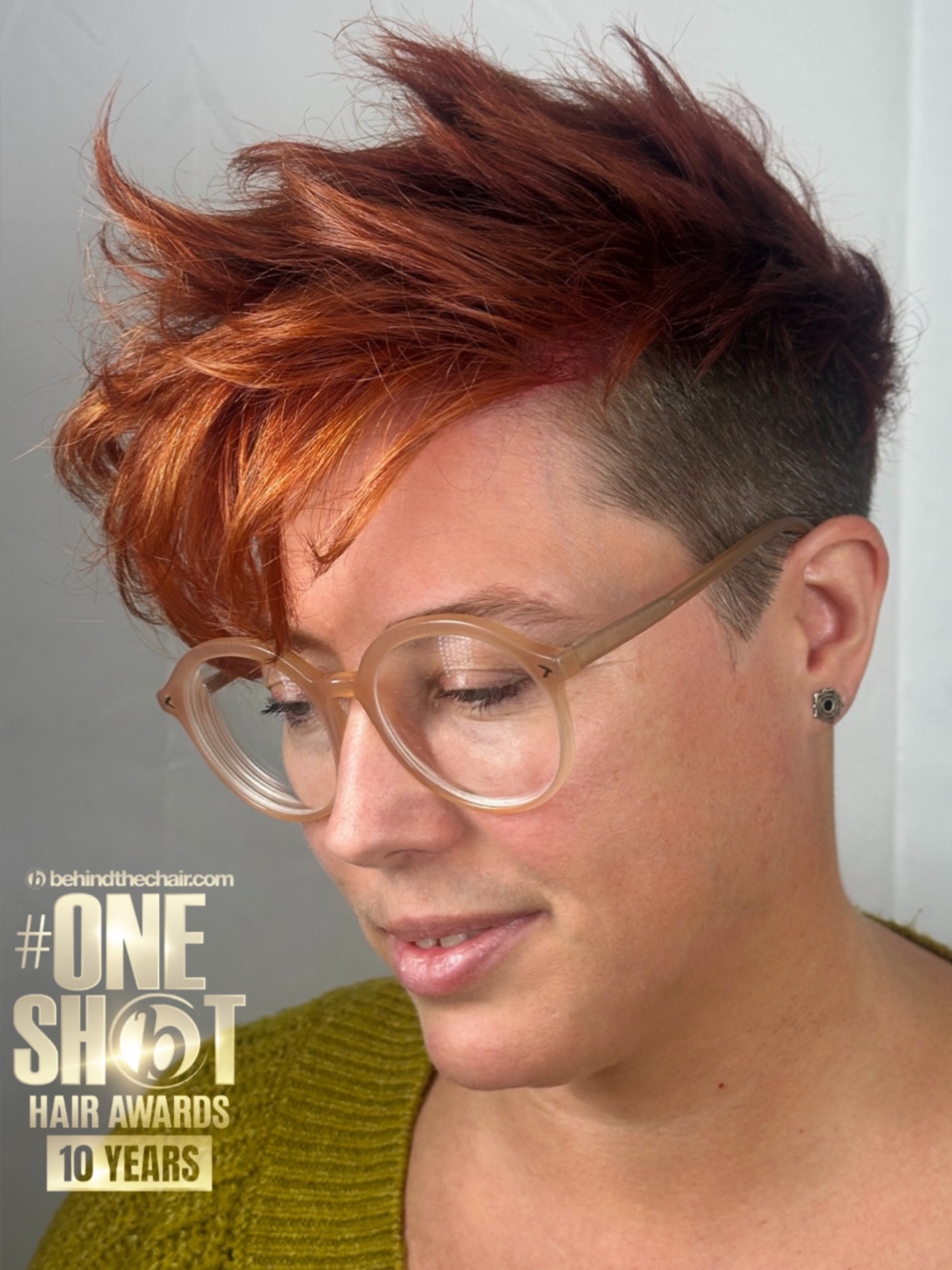 Undercut Pixie on Thick Hair with Buzzed Sides and Long Textured Top Showing Visible Contrast