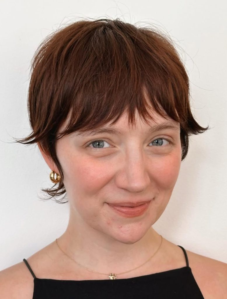 Woman Blow-Drying a Growing-Out Pixie with a Small Round Brush for Volume