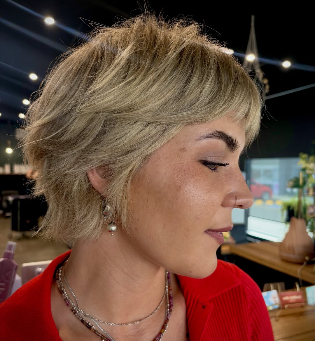 Side View of a Textured Ash Blonde Pixie Bob with a Short Soft Fringe