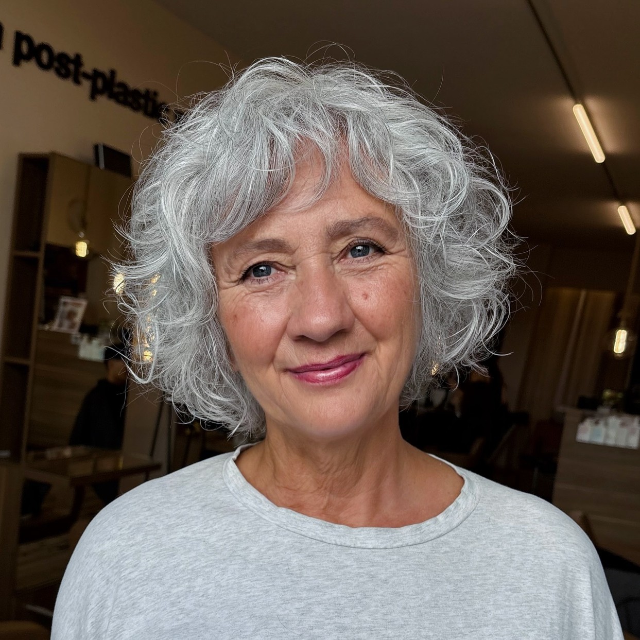 Voluminous Curly Silver Bob Haircut