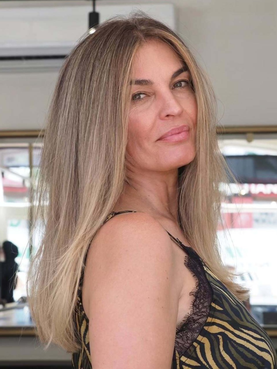 Side Profile of Long Straight Caramel Blonde Hair