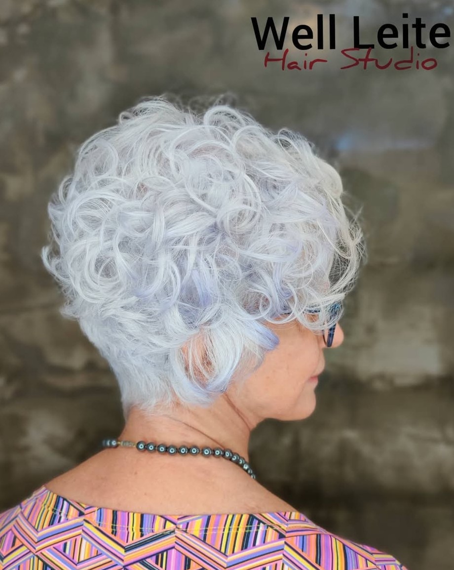 Side Profile of Short Curly White Hair with Subtle Purple Tint