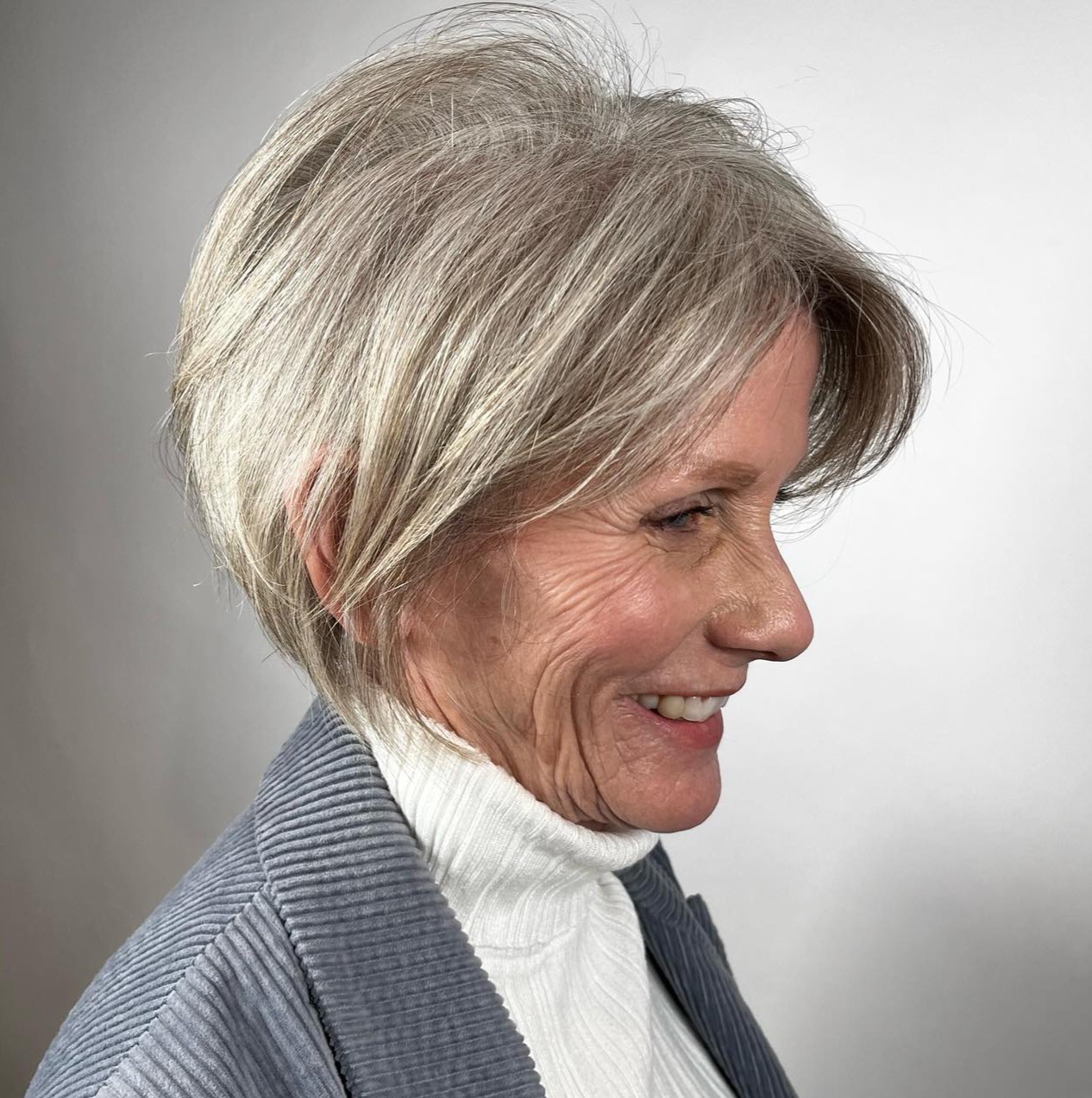 Side Profile of a Short Stacked Grey Bob Haircut
