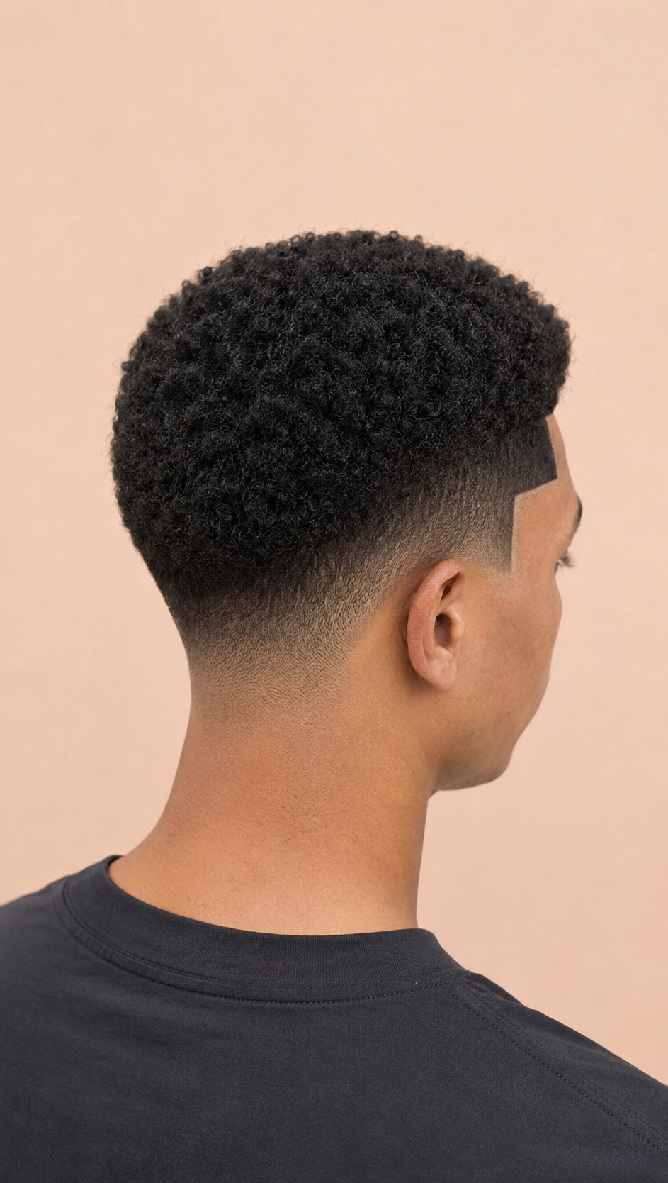 Thick Coarse Textured Top With Gradual Mid Taper Fade
