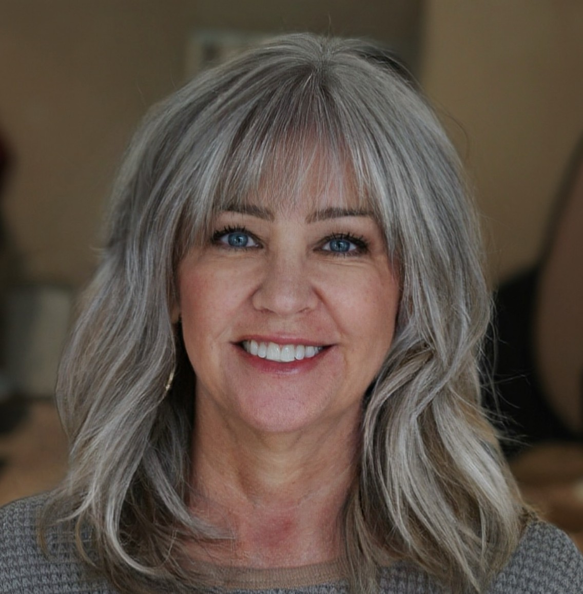 Layered Salt and Pepper Medium Hairstyle with Fringe
