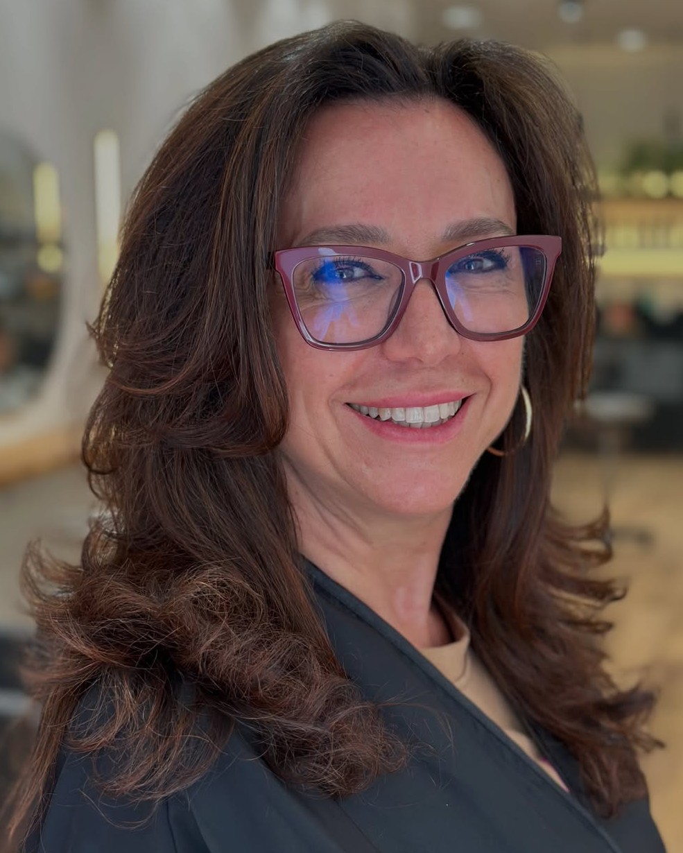 Long Voluminous Dark Brown Layered Hair with Outward Curls