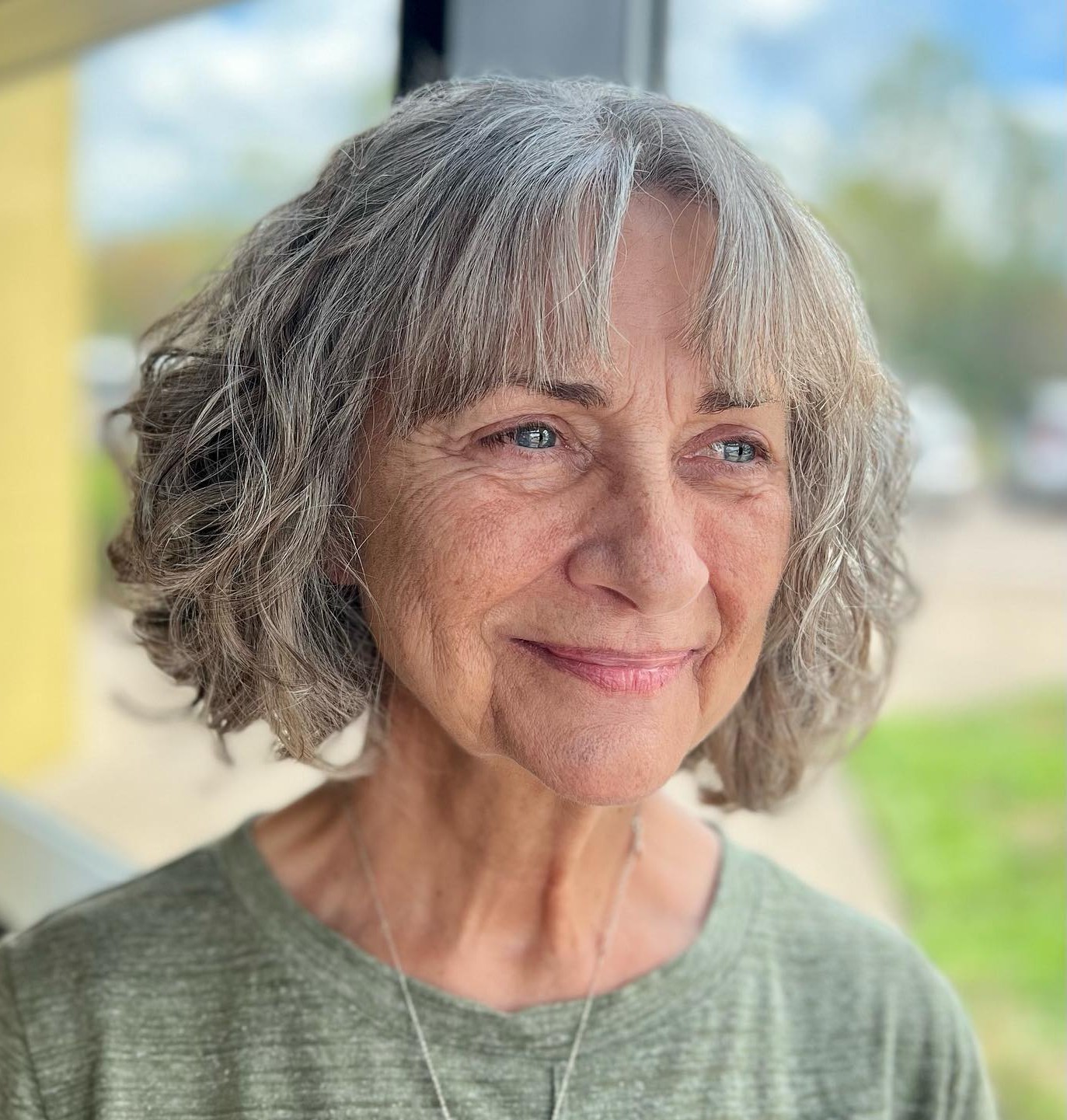 Textured Wavy Grey Bob with Wispy Bangs