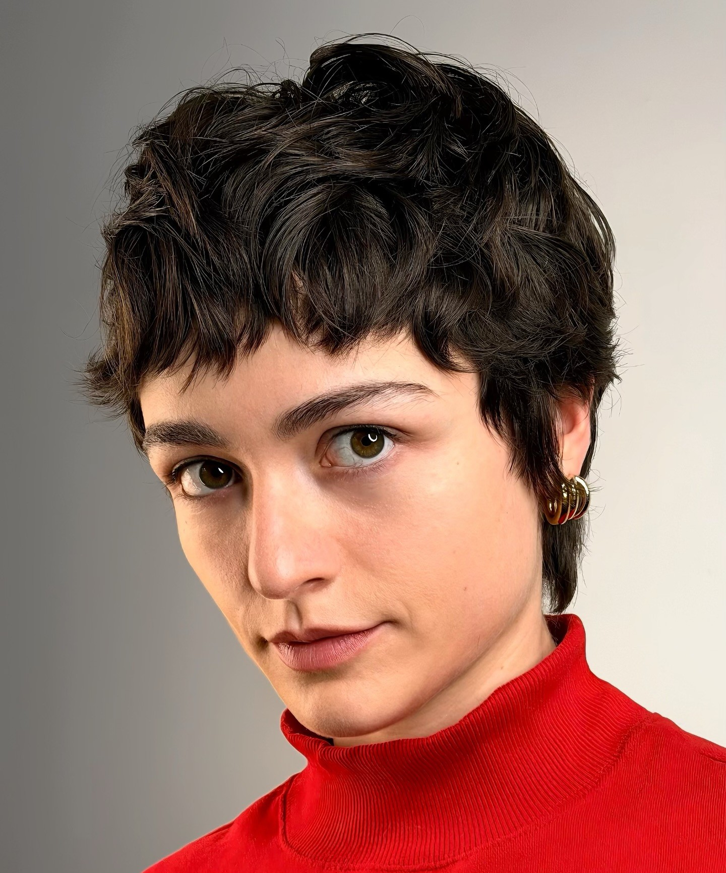 Styling Products for Thick Pixie Cuts Including Matte Clay and Texturizing Paste on a Salon Counter