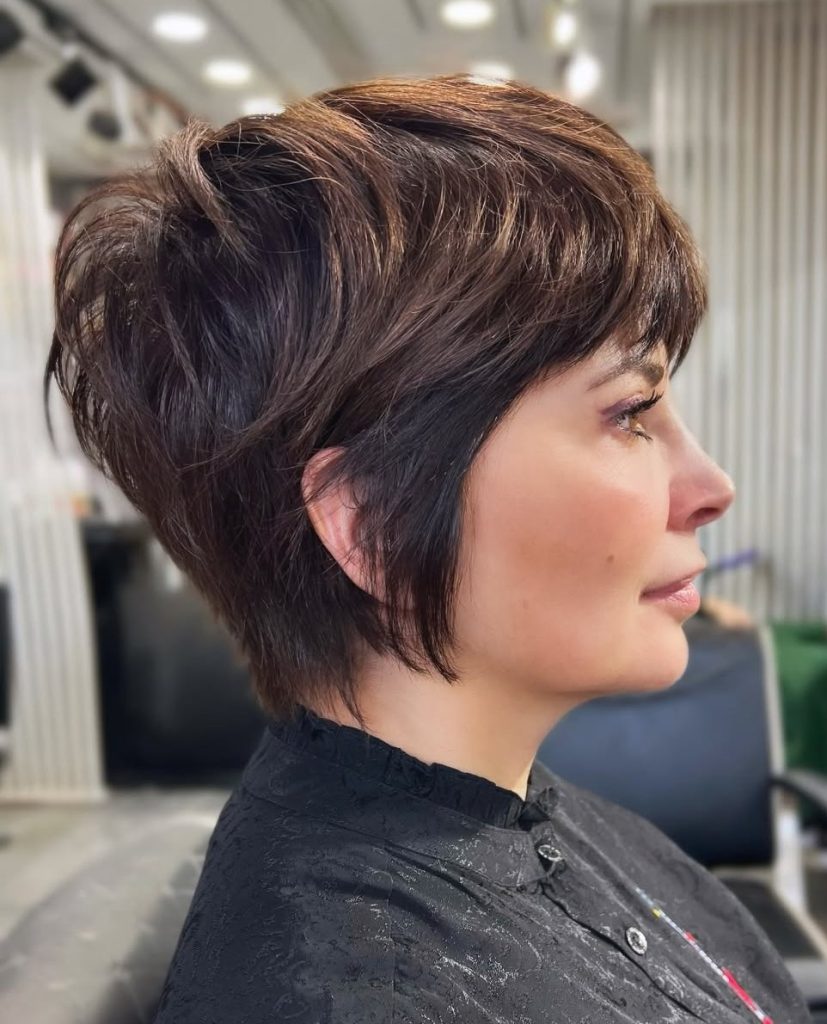 Example of an Untrimmed Pixie Grow-Out Developing a Mullet-Like Shape at the Nape