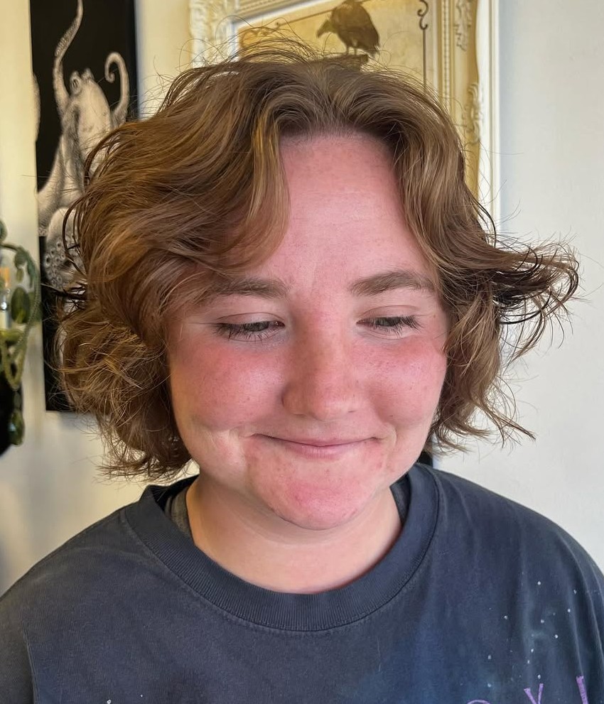Short Wavy Light Brown Haircut with Center Part and Textured Layers