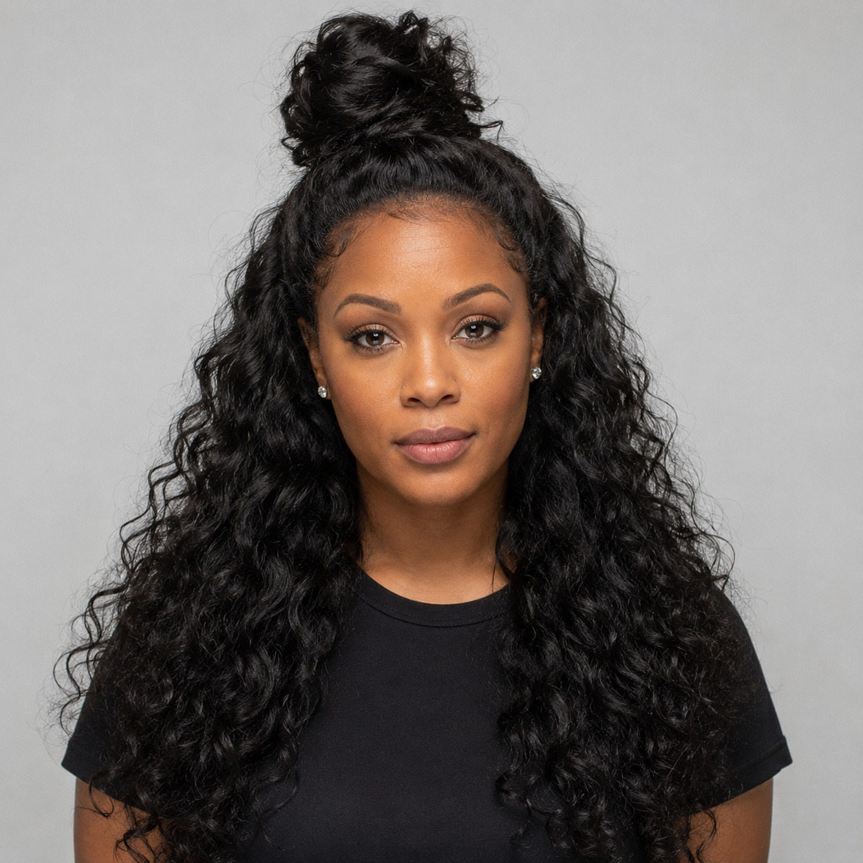 High Top Knot With Long Wavy Hair