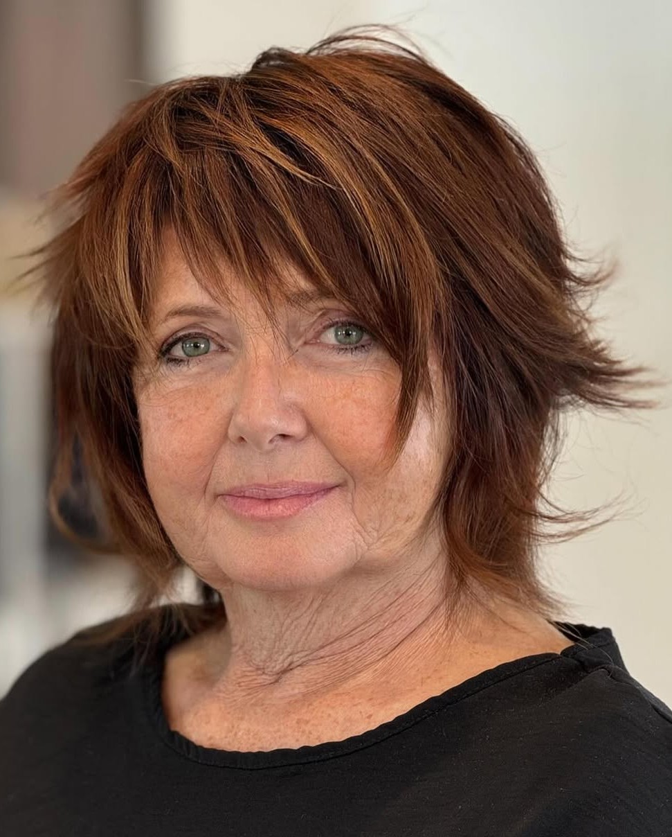 Edgy Choppy Brown Haircut with Wispy Fringe