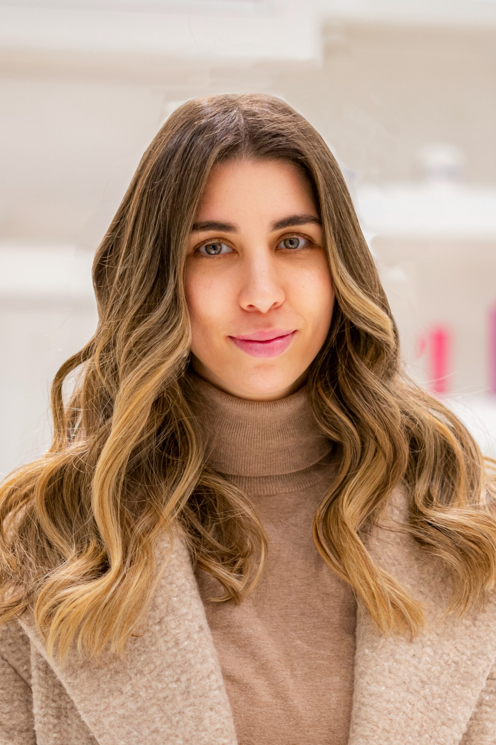 Balayage on Brown Hair with Soft Hand-Painted Caramel Highlights through the Mid-Lengths and Ends on Wavy Medium Brown Hair