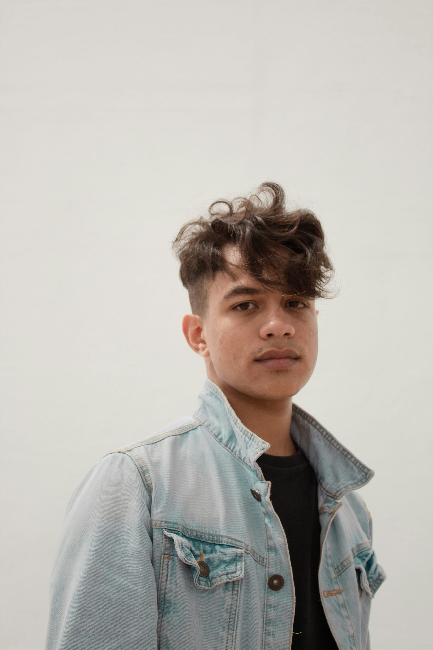 Boy Fringe Haircut Boy Fringe Haircut with Textured Fringe and Mid Fade, Teen Age, Brown Hair