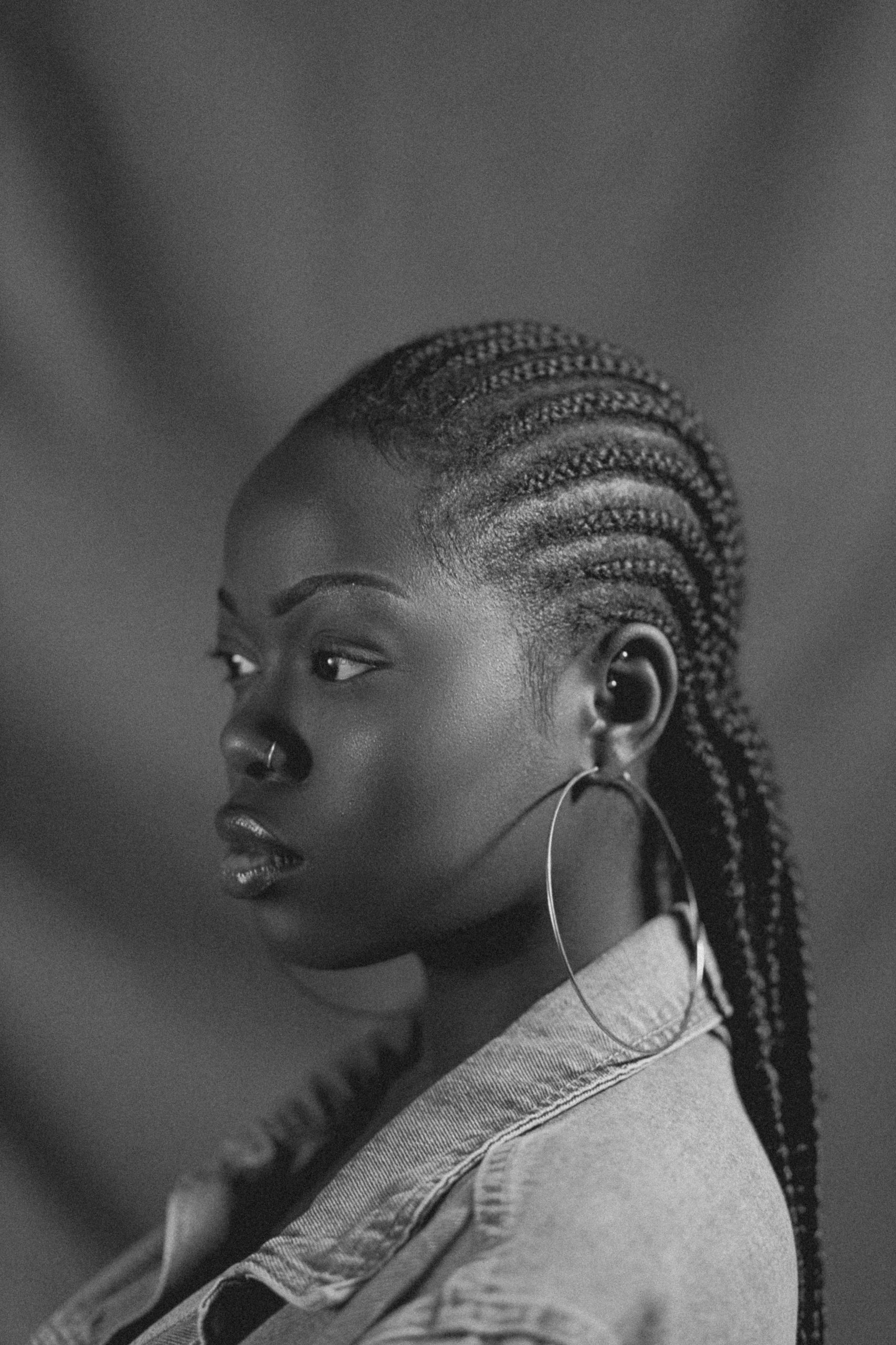 Braided Ponytail Hairstyle with Sleek Feed-In Cornrows Gathered into a Long High Ponytail on Natural Hair