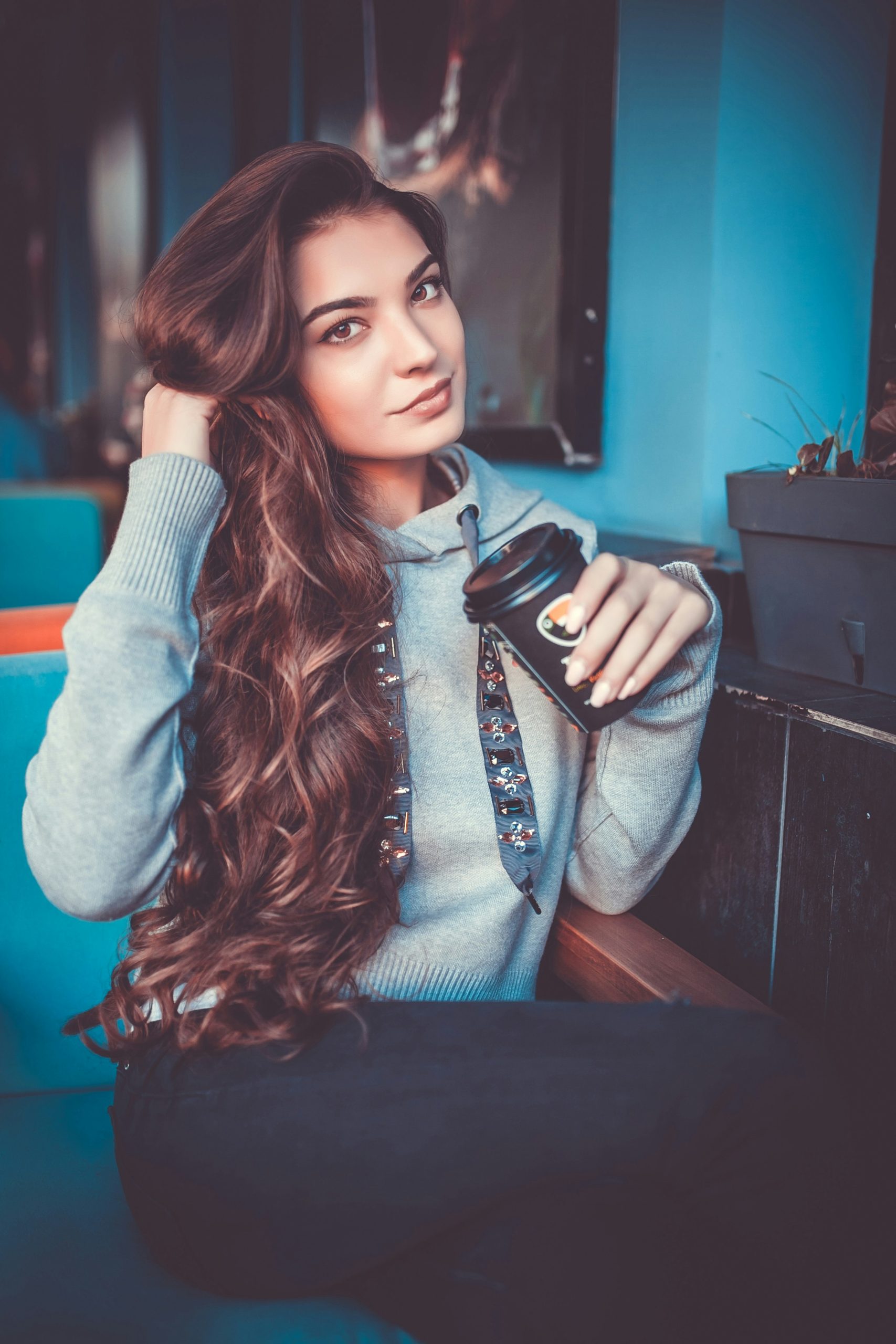 Caramel Balayage Highlights on Dark Brown Wavy Hair with Soft Face-Framing Pieces