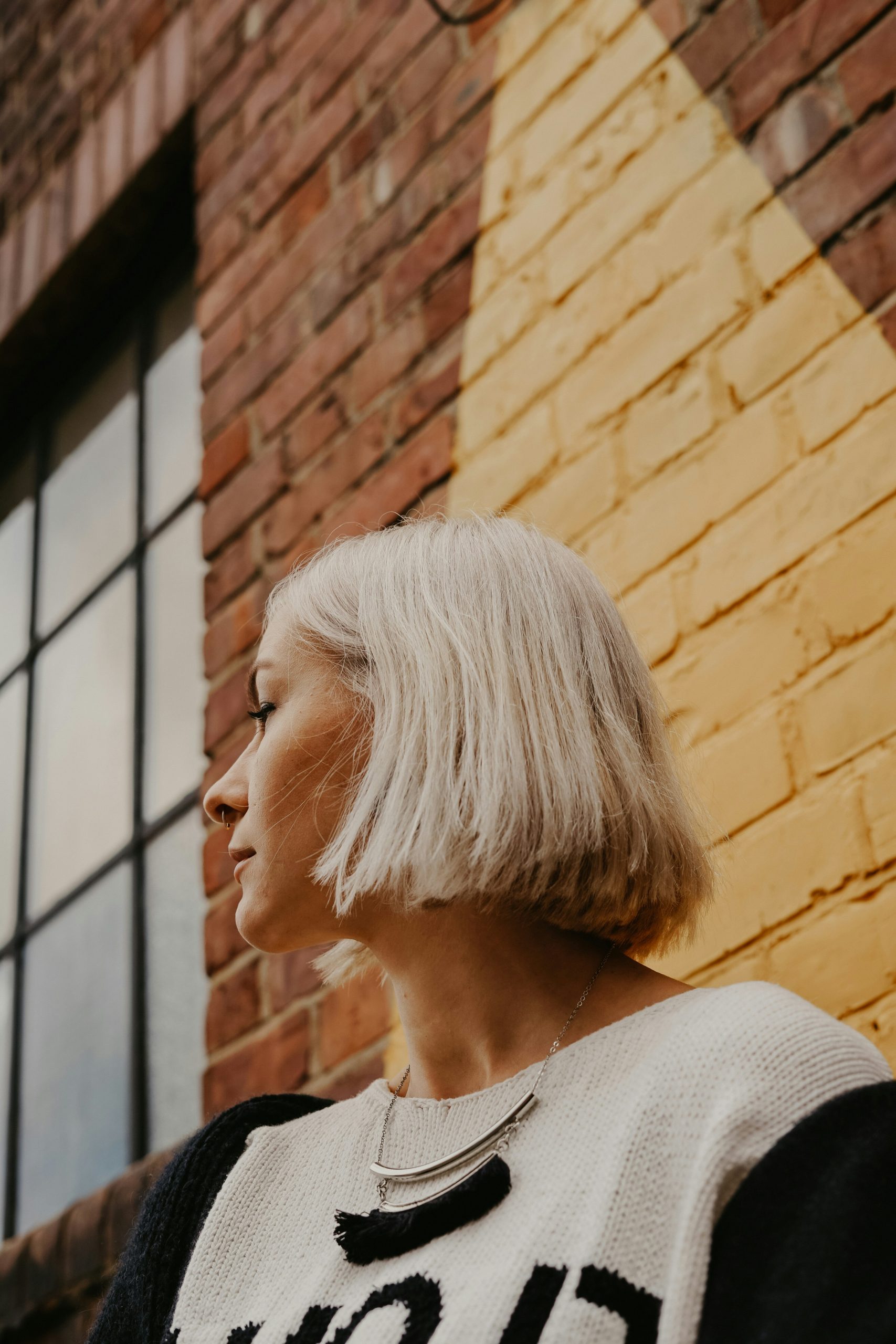 The Karen Haircut as an Angled Inverted Bob with Stacked Back Layers and Blended Highlights