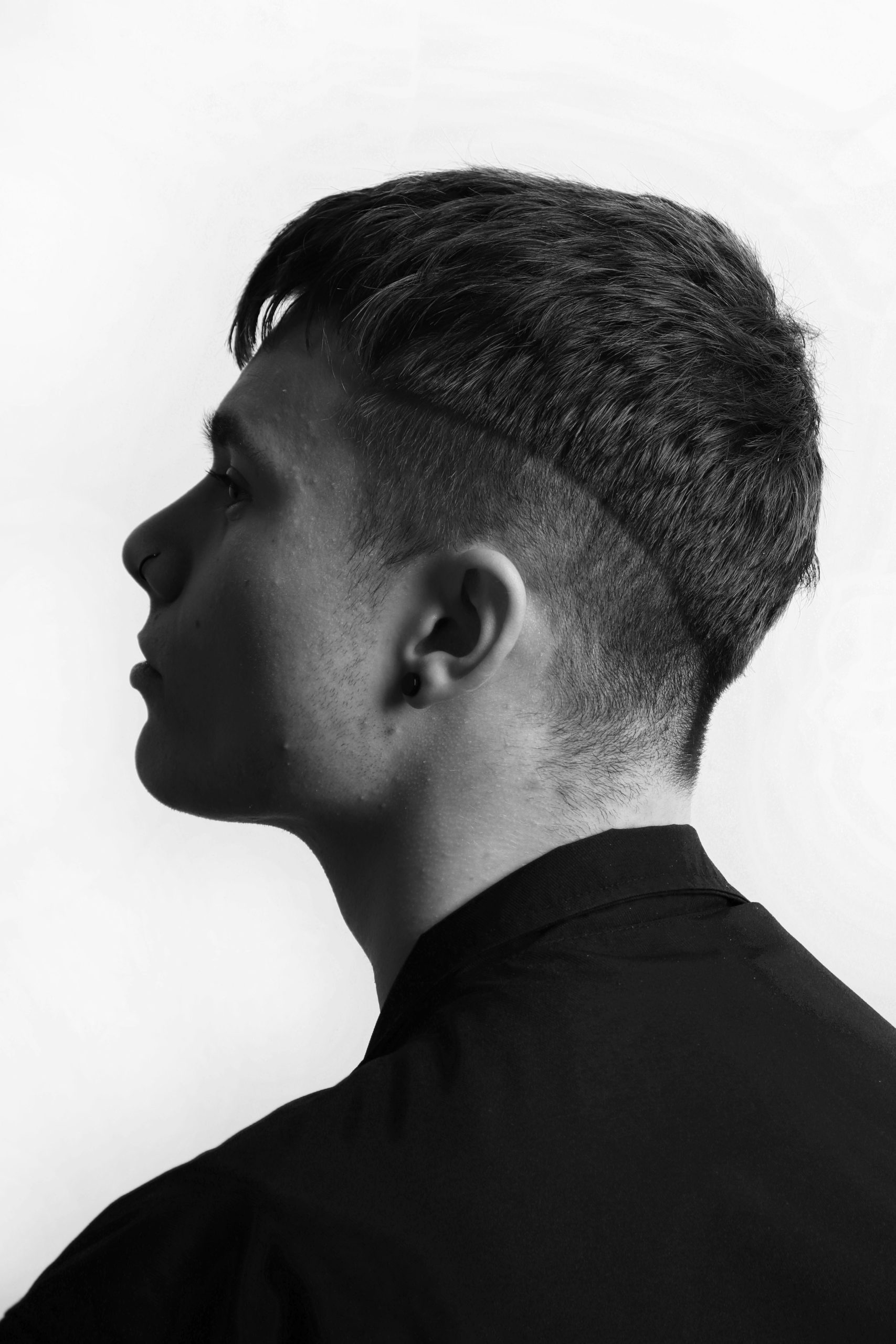 Mod Cut Haircut Man With Rounded Fringe And Blended Sides