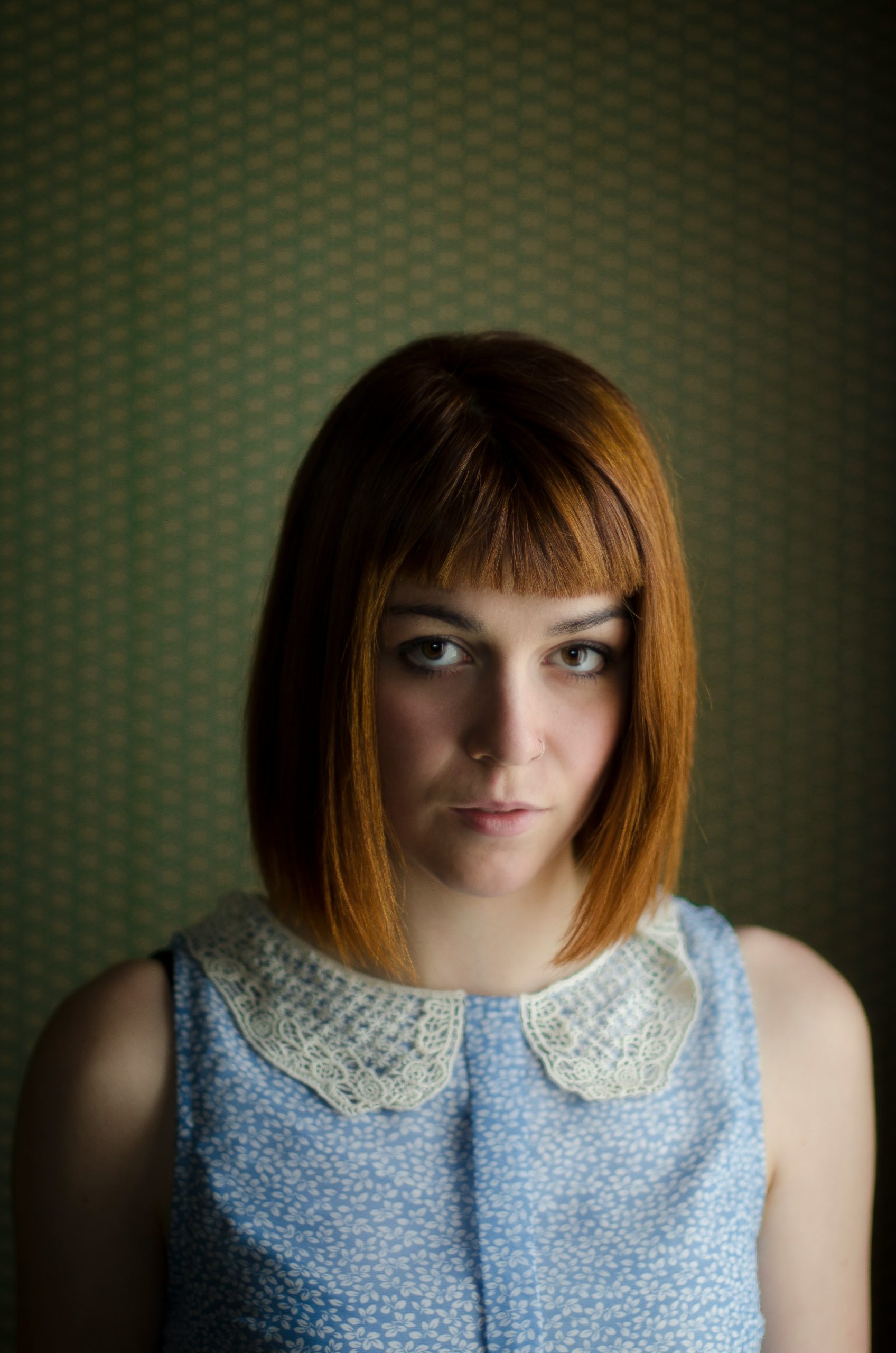 Woman with a Soft Wispy Fringe Framing the Face on Wavy Hair