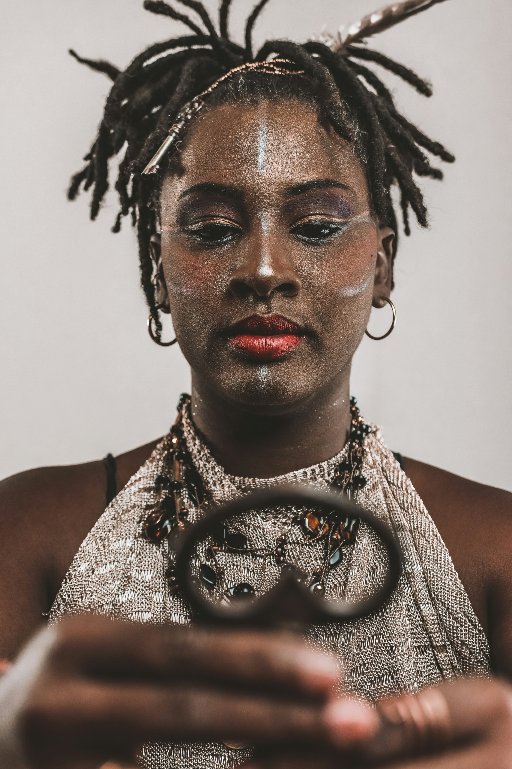 Butterfly Locs with Distressed Boho Texture and Looped Curly Wraps on Mid-Length Hair