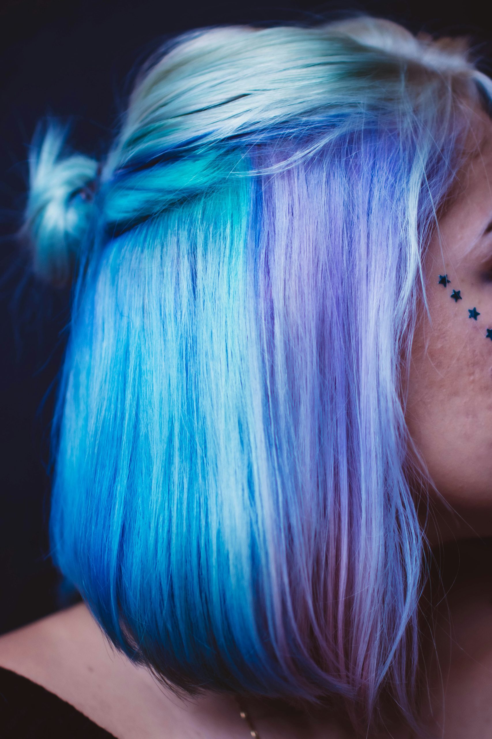 Color Block Hair with Bold Half-and-Half Split on Shoulder Length Dark Brown and Platinum Blonde