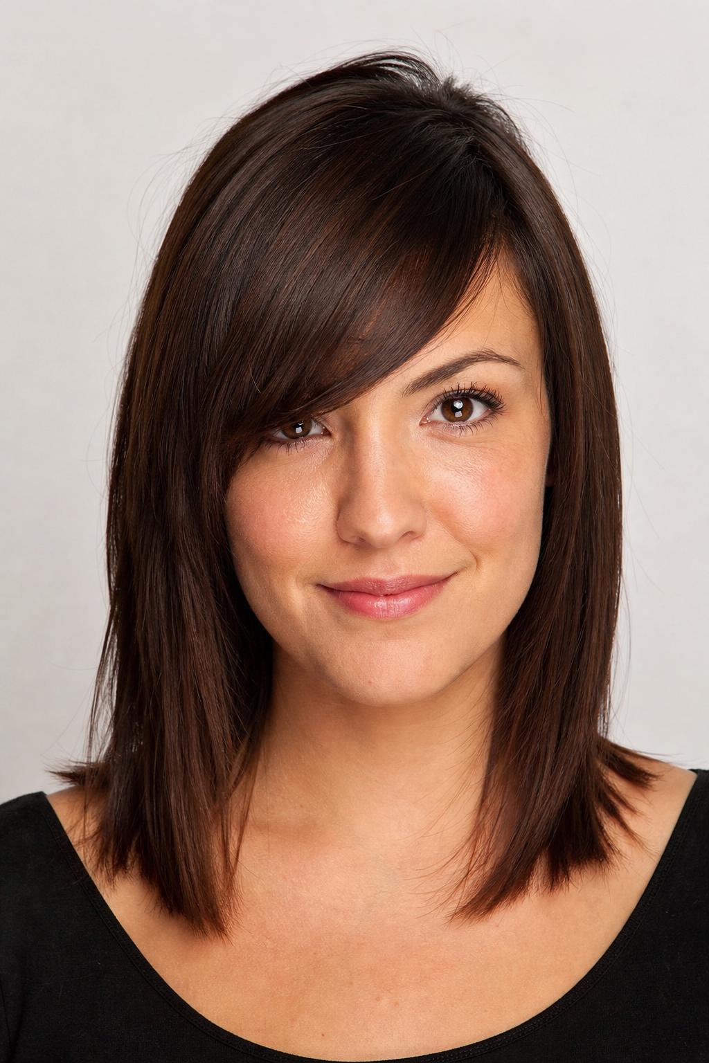 Deep Side-Slant Fringe Falling Naturally into Place on Straight Espresso Hair